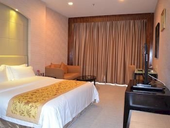 Imagen de la habitación del Hotel Jihua Business. Foto 2