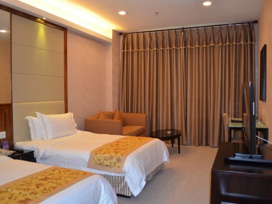 Imagen de la habitación del Hotel Jihua Business. Foto 4