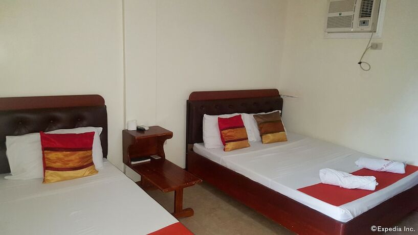 Imagen de la habitación del Hotel Jilian Tourist Inn. Foto 6