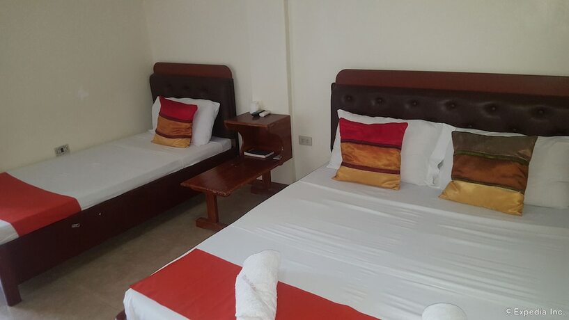 Imagen de la habitación del Hotel Jilian Tourist Inn. Foto 8