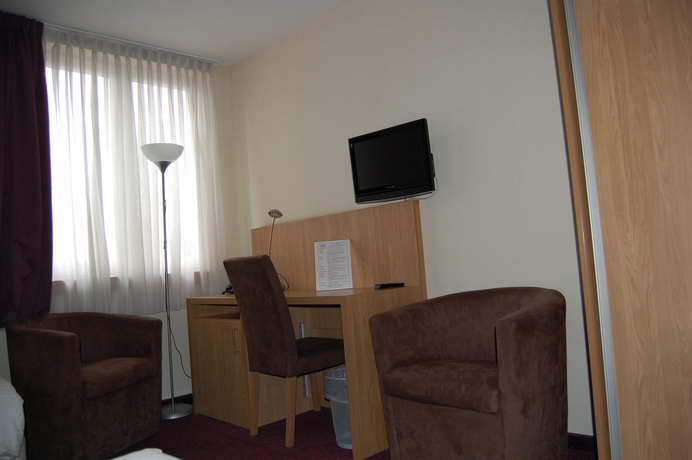 Imagen de la habitación del Hotel Jill Brussels. Foto 10