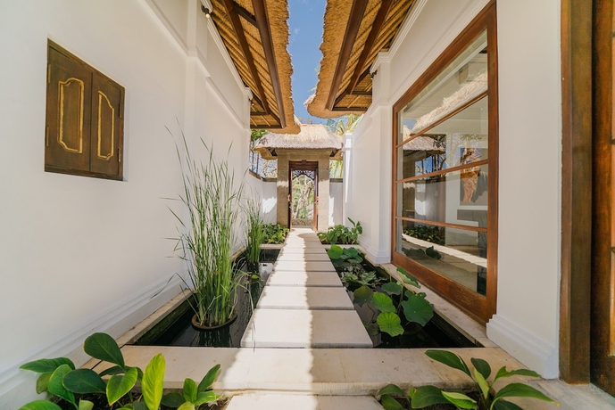 Imagen de la habitación del Hotel Jimbaran Beach Villas By Nakula. Foto 7