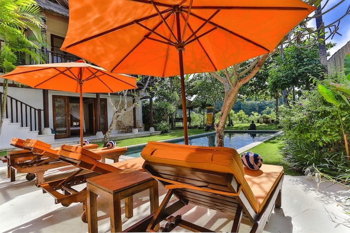 Imagen de la habitación del Hotel Jimbaran Beach Villas By Nakula. Foto 11