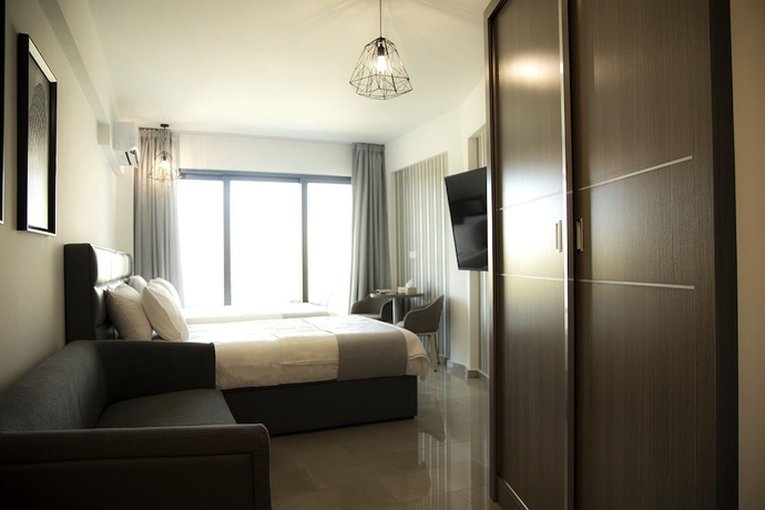 Imagen de la habitación del Hotel Jimmy\'s Suites. Foto 3