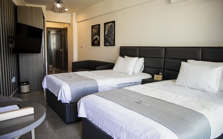 Imagen de la habitación del Hotel Jimmy\'s Suites. Foto 6