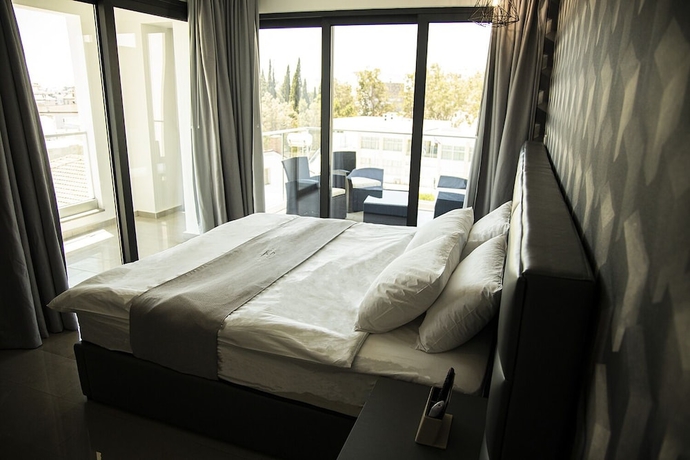 Imagen de la habitación del Hotel Jimmy\'s Suites. Foto 7