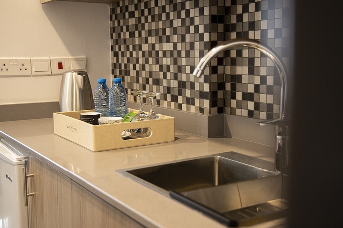 Imagen de la habitación del Hotel Jimmy\'s Suites. Foto 10