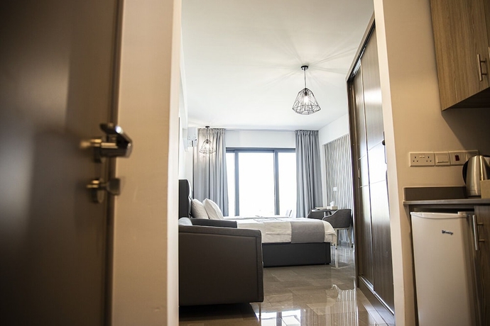 Imagen de la habitación del Hotel Jimmy\'s Suites. Foto 12
