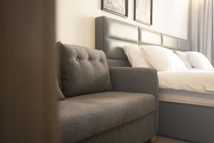 Imagen de la habitación del Hotel Jimmy\'s Suites. Foto 13