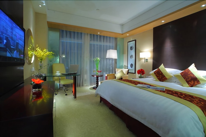 Imagen de la habitación del Hotel Jin Chang New Century Shaoxing. Foto 8