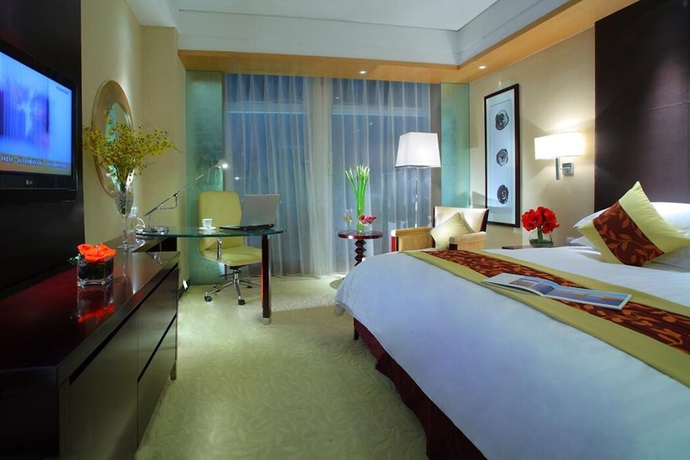 Imagen de la habitación del Hotel Jin Chang New Century Shaoxing. Foto 9