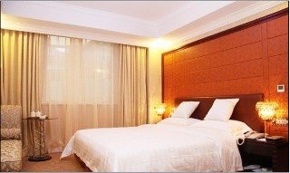 Imagen de la habitación del Hotel Jin Cheng. Foto 11