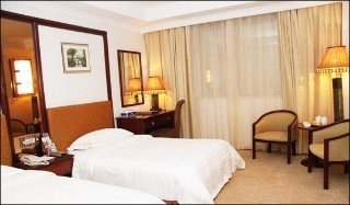 Imagen de la habitación del Hotel Jin Cheng. Foto 13