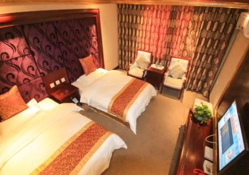 Imagen general del Hotel Jin Cheng International Holiday. Foto 4