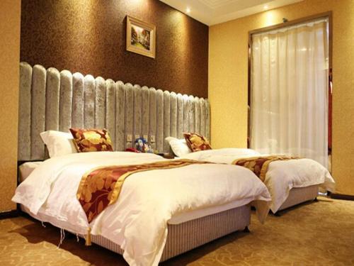 Imagen de la habitación del Hotel Jin Dun Celebrity International. Foto 5