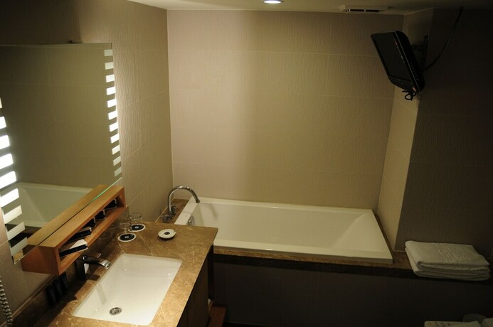 Imagen de la habitación del Hotel Jin Hua. Foto 34