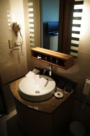 Imagen de la habitación del Hotel Jin Hua. Foto 35