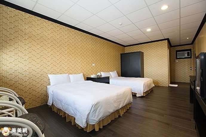 Imagen de la habitación del Hotel Jin Huei. Foto 2