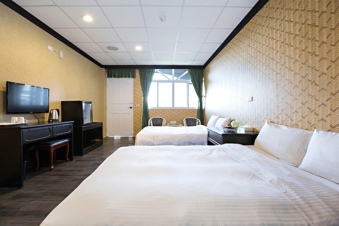 Imagen de la habitación del Hotel Jin Huei. Foto 6