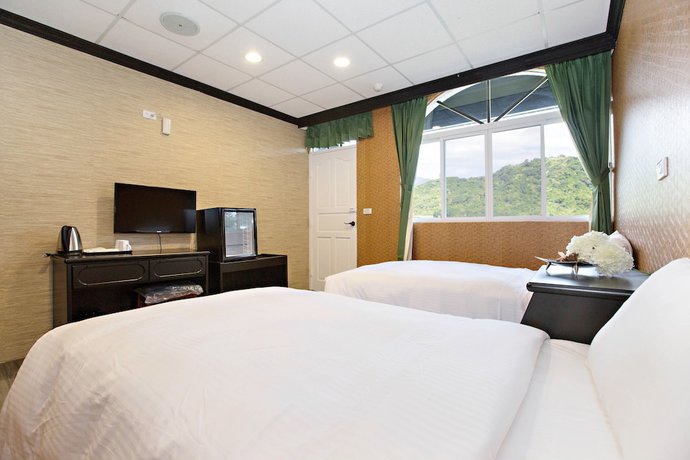 Imagen de la habitación del Hotel Jin Huei. Foto 7