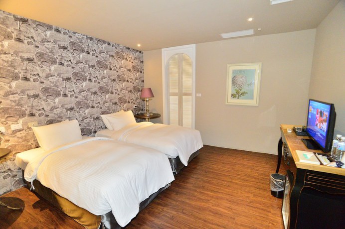 Imagen de la habitación del Hotel Jin Huei. Foto 10