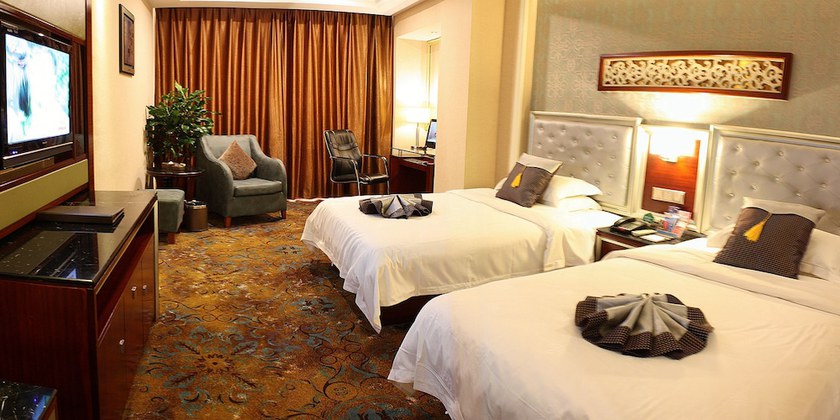 Imagen de la habitación del Hotel Jin Hui. Foto 5