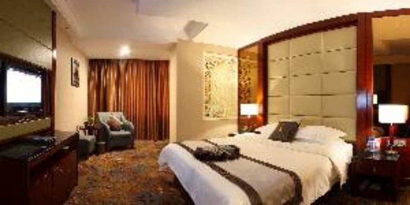 Imagen de la habitación del Hotel Jin Hui. Foto 7