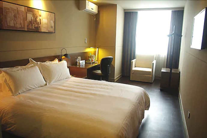 Imagen de la habitación del Hotel Jin Jiang Inn Shanghai Hongqiao Station. Foto 10