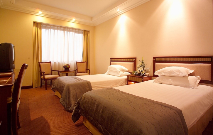 Imagen de la habitación del Hotel Jin Jiang Jing An. Foto 2