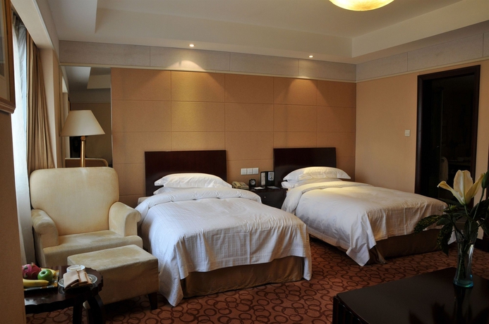 Imagen de la habitación del Hotel Jin Jiang Jing An. Foto 3