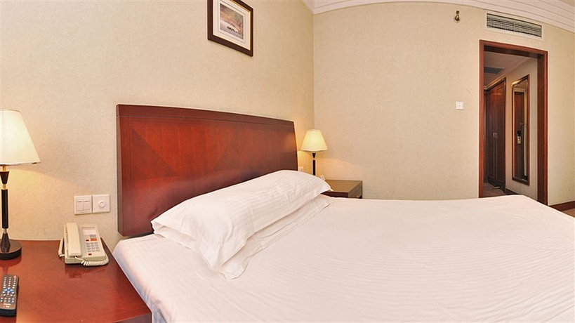 Imagen de la habitación del Hotel Jin Jiang Pacific Shanghai. Foto 6