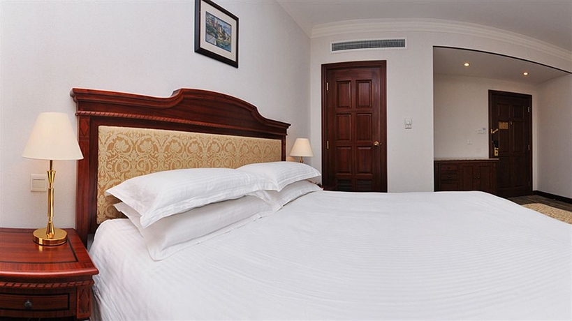 Imagen de la habitación del Hotel Jin Jiang Pacific Shanghai. Foto 7