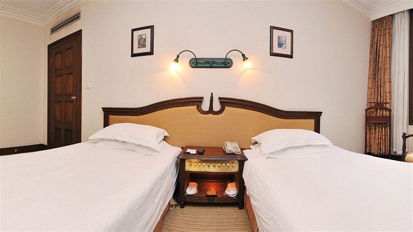 Imagen de la habitación del Hotel Jin Jiang Pacific Shanghai. Foto 8