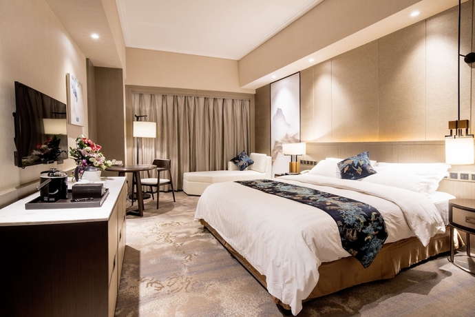 Imagen de la habitación del Hotel Jin Jiang Pine City. Foto 12