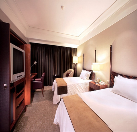 Imagen de la habitación del Hotel Jin Jiang Shanghai. Foto 6