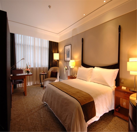Imagen de la habitación del Hotel Jin Jiang Shanghai. Foto 7