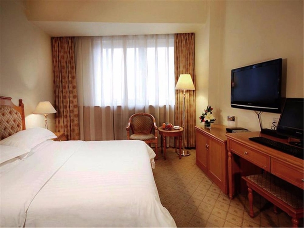 Imagen de la habitación del Hotel Jin Jiang Sun. Foto 11