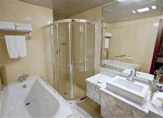 Imagen de la habitación del Hotel Jin Jiang Sun. Foto 13