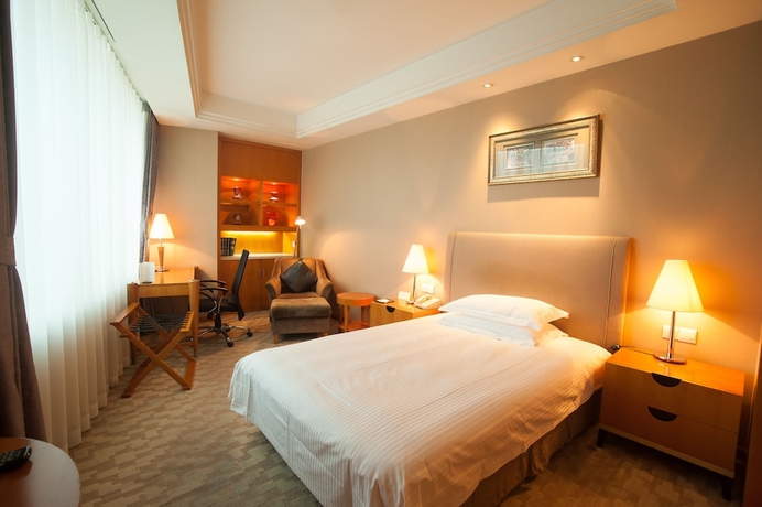 Imagen de la habitación del Hotel Jin Jiang Tian Cheng. Foto 4