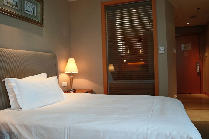Imagen de la habitación del Hotel Jin Jiang Tian Cheng. Foto 5