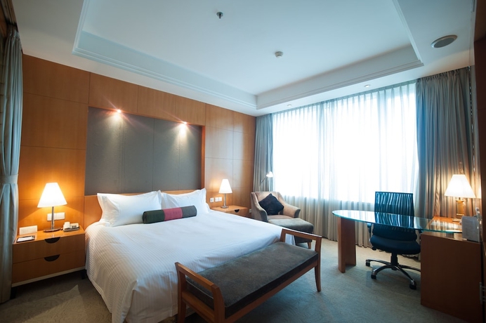 Imagen de la habitación del Hotel Jin Jiang Tian Cheng. Foto 7