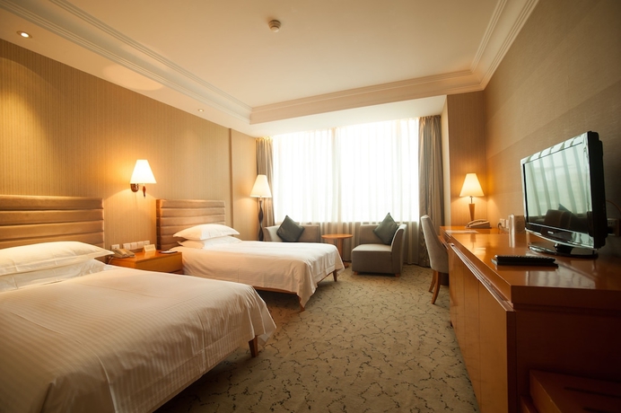 Imagen de la habitación del Hotel Jin Jiang Tian Cheng. Foto 9