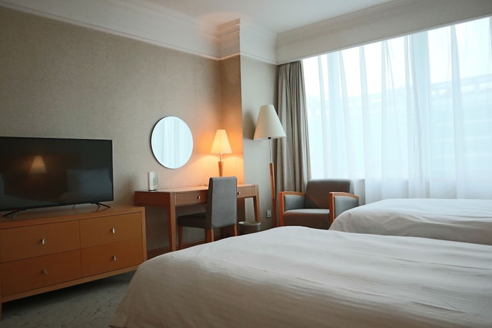 Imagen de la habitación del Hotel Jin Jiang Tian Cheng. Foto 10