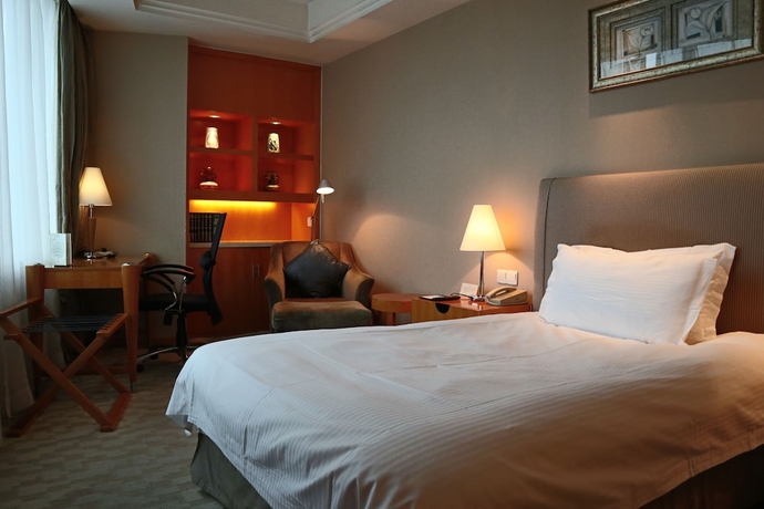 Imagen de la habitación del Hotel Jin Jiang Tian Cheng. Foto 13