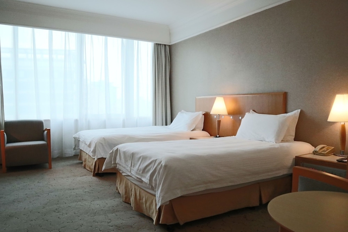 Imagen de la habitación del Hotel Jin Jiang Tian Cheng. Foto 14