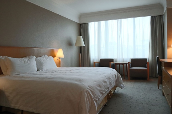 Imagen de la habitación del Hotel Jin Jiang Tian Cheng. Foto 16