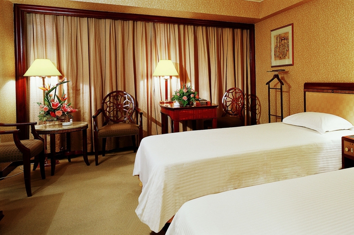 Imagen de la habitación del Hotel Jin Jiang Tower. Foto 6