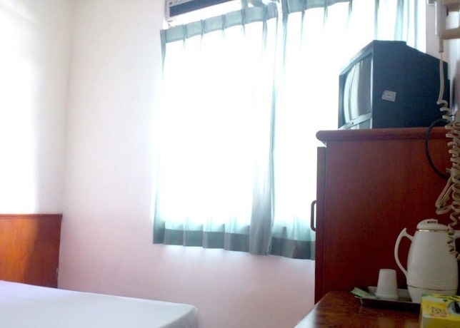 Imagen de la habitación del Hotel Jin Lon. Foto 12