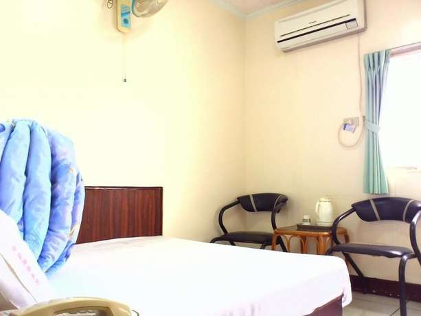 Imagen de la habitación del Hotel Jin Lon. Foto 13