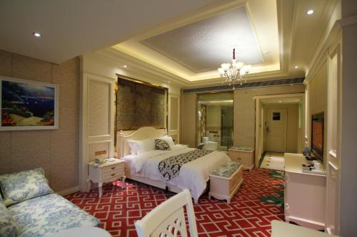 Imagen de la habitación del Hotel Jin Long Wan Hao. Foto 3